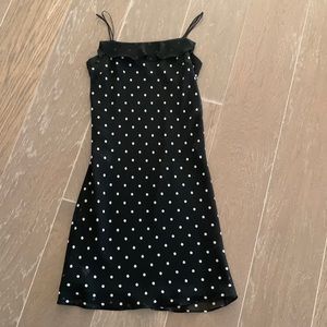Chiffon style poly blend polka dot spaghetti strap dress.